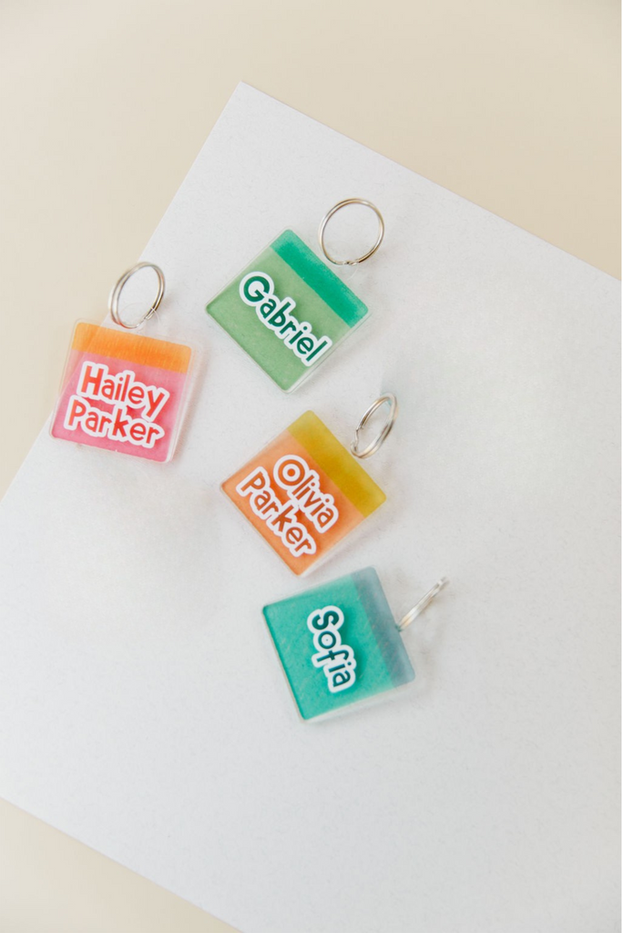 Colorful name tags on a white background